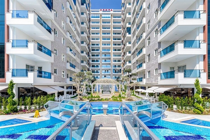 Двухкомнатная квартира 1+1 с мебелью и богатой инфраструктурой в районе Махмутлар