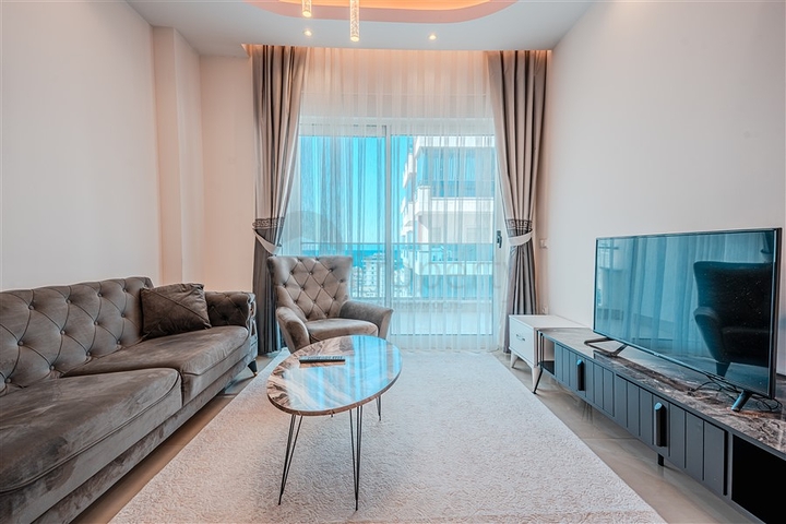 Двухкомнатная квартира 1+1 с мебелью и богатой инфраструктурой в районе Махмутлар