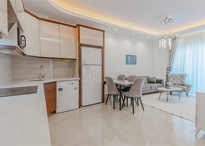 Двухкомнатная квартира 1+1 с мебелью и богатой инфраструктурой в районе Махмутлар