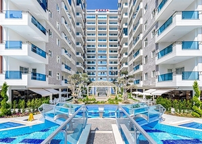 Двухкомнатная квартира 1+1 с мебелью и богатой инфраструктурой в районе Махмутлар