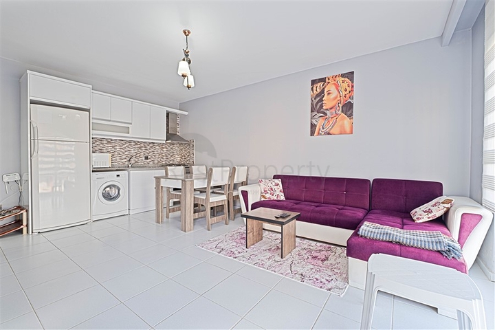 Двухкомнатная квартира 1+1 с мебелью и балконом в районе Махмутлар