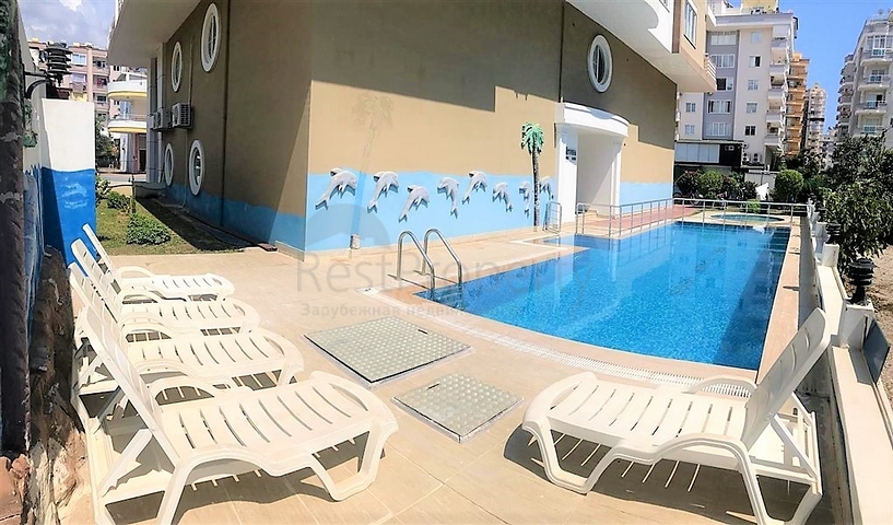 Двухкомнатная квартира 1+1 с мебелью и балконом в районе Махмутлар