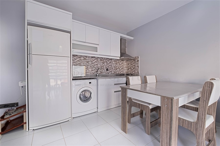 Двухкомнатная квартира 1+1 с мебелью и балконом в районе Махмутлар