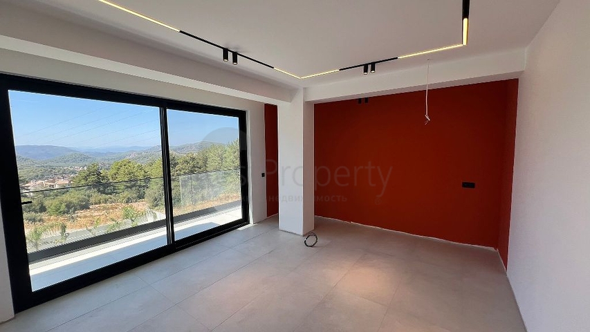 Современная отдельная вилла 4+1 с большим участком в Фетхие