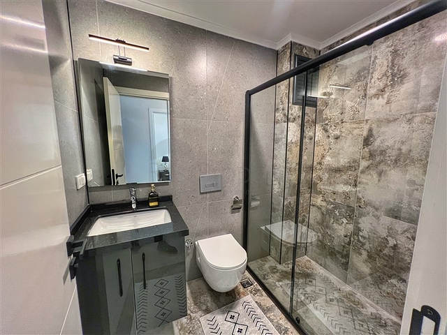 Двухкомнатная квартира 1+1 в современном доме района Оба