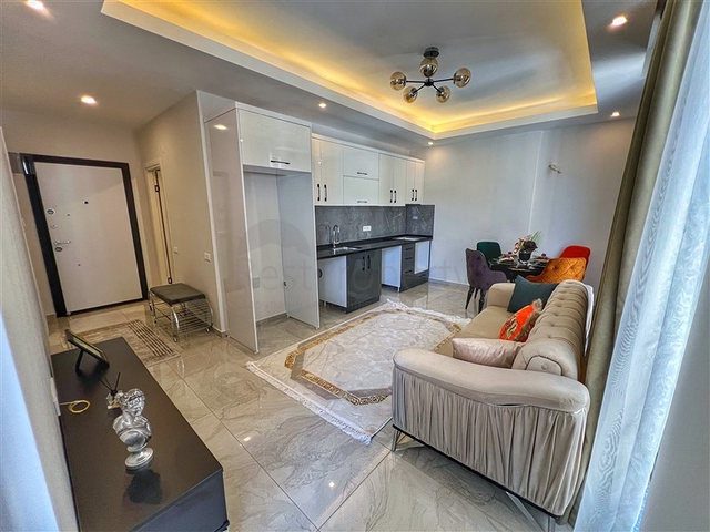 Двухкомнатная квартира 1+1 в современном доме района Оба