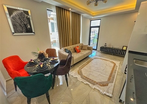 Двухкомнатная квартира 1+1 в современном доме района Оба