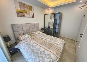 Двухкомнатная квартира 1+1 в современном доме района Оба