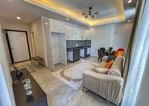 Двухкомнатная квартира 1+1 в современном доме района Оба