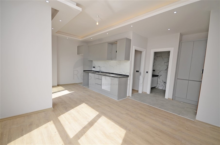 Однокомнатная квартира 1+1 в современном жилом доме района Авсаллар