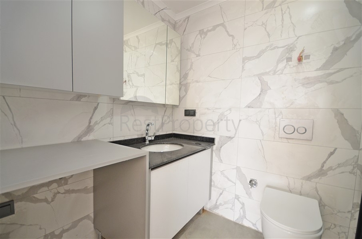 Однокомнатная квартира 1+1 в современном жилом доме района Авсаллар