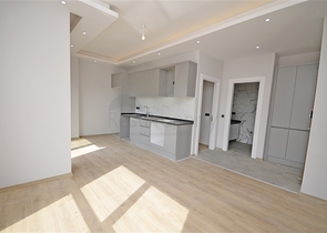 Однокомнатная квартира 1+1 в современном жилом доме района Авсаллар