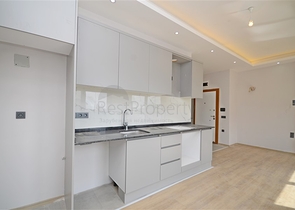 Однокомнатная квартира 1+1 в современном жилом доме района Авсаллар