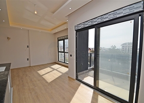 Однокомнатная квартира 1+1 в современном жилом доме района Авсаллар