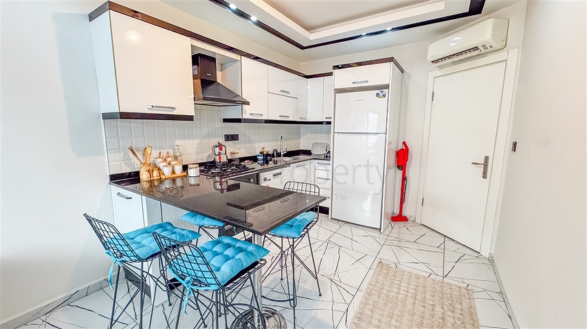 Двухкомнатная квартира 1+1 в центре Аланьи рядом с городской инфраструктурой