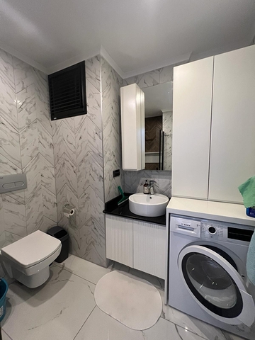 Двухкомнатная квартира 1+1 в центре Аланьи в современном жилом доме