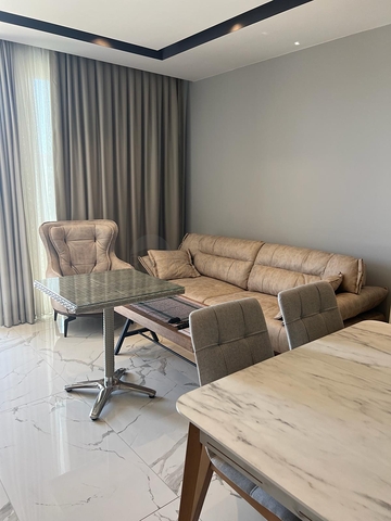 Двухкомнатная квартира 1+1 в центре Аланьи в современном жилом доме