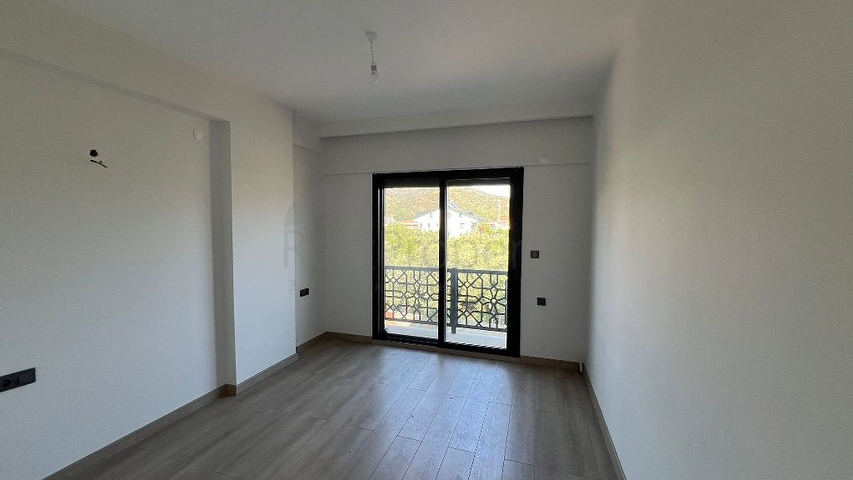 Просторный отдельно стоящий дом с собственным участком в районе Карагедик, Фетхие