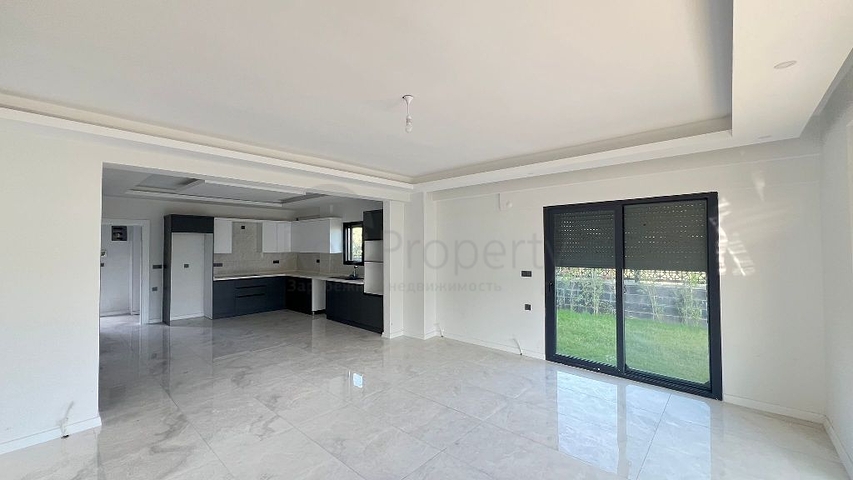 Просторный отдельно стоящий дом с собственным участком в районе Карагедик, Фетхие