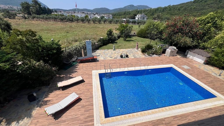 Уютный дом с большим участком в районе Олюдениз, Фетхие