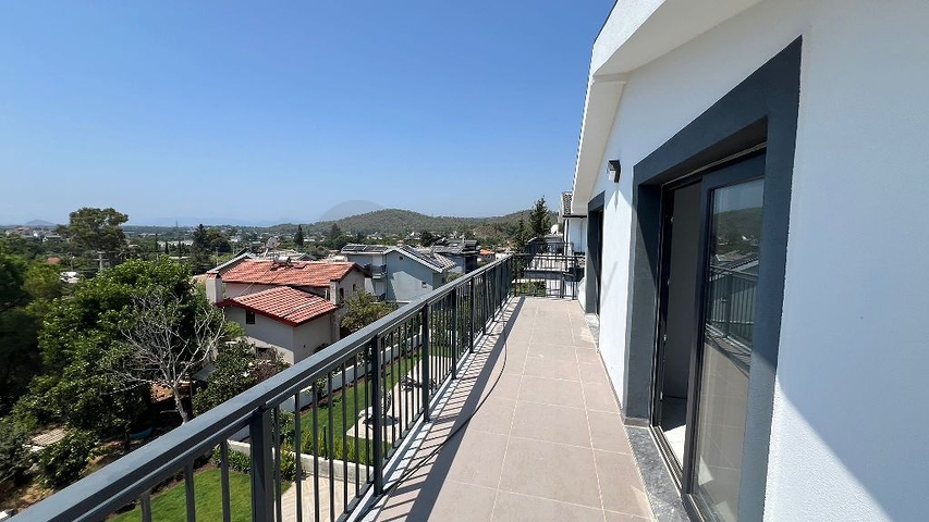 Уютный отдельно стоящий дом с участком в районе Фетхие