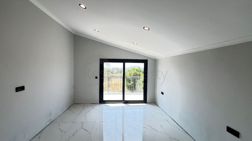 Уютный отдельно стоящий дом с участком в районе Фетхие