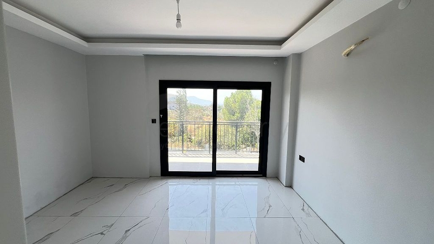 Уютный отдельно стоящий дом с участком в районе Фетхие