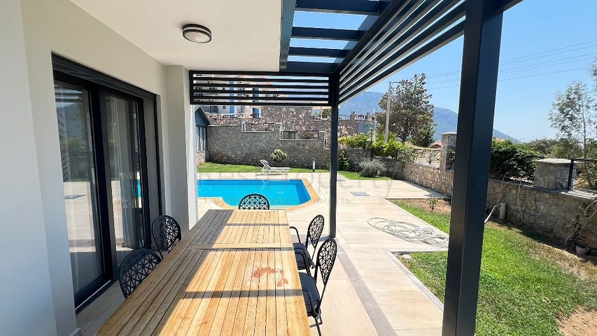 Просторный отдельно стоящий дом в районе Овачик, Фетхие