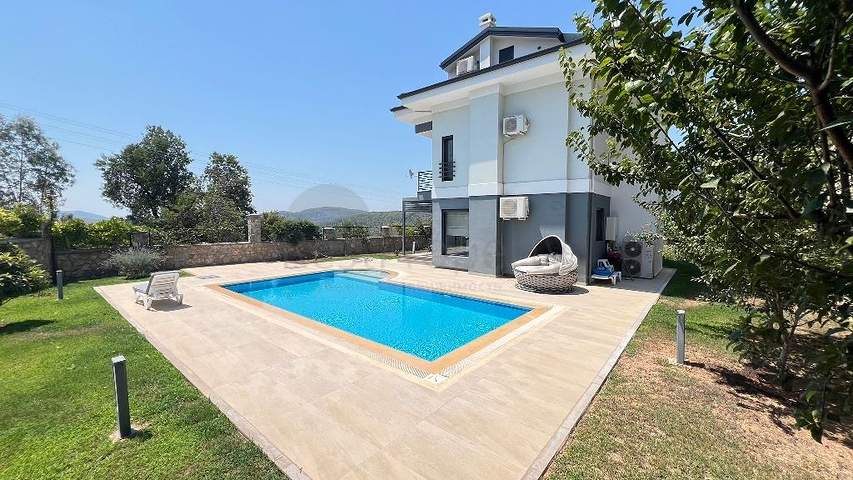 Просторный отдельно стоящий дом в районе Овачик, Фетхие