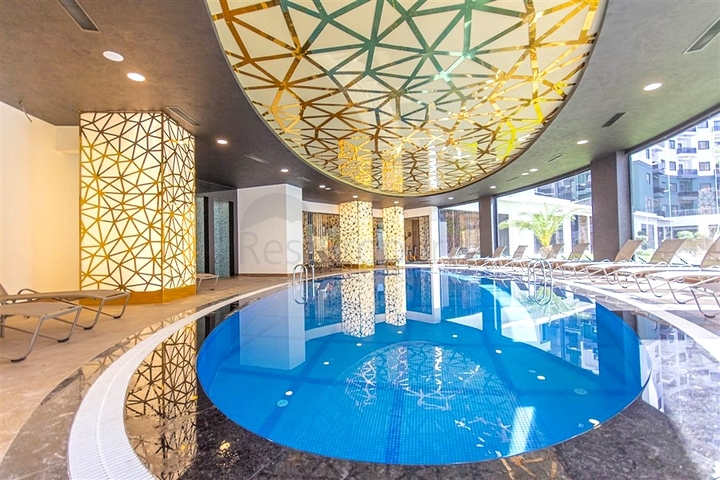 Меблированная квартира 1+1 с развитой инфраструктурой в Махмутларе