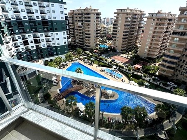 Меблированная квартира 1+1 с развитой инфраструктурой в Махмутларе