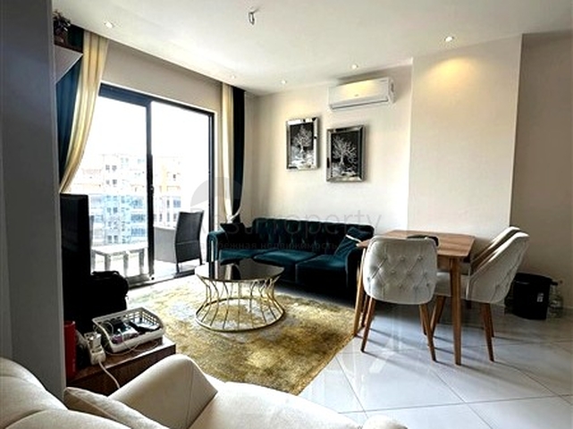 Меблированная квартира 1+1 с развитой инфраструктурой в Махмутларе