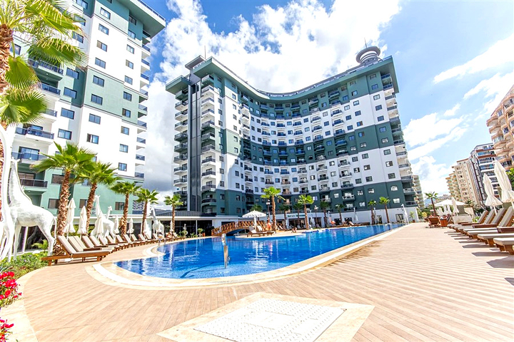 Меблированная квартира 1+1 с развитой инфраструктурой в Махмутларе