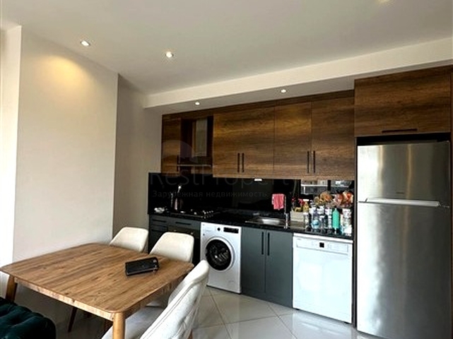 Меблированная квартира 1+1 с развитой инфраструктурой в Махмутларе