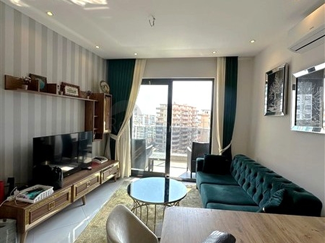 Меблированная квартира 1+1 с развитой инфраструктурой в Махмутларе