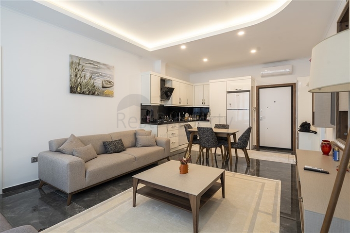 Уютная квартира 1+1 в современном жилом комплексе района Оба