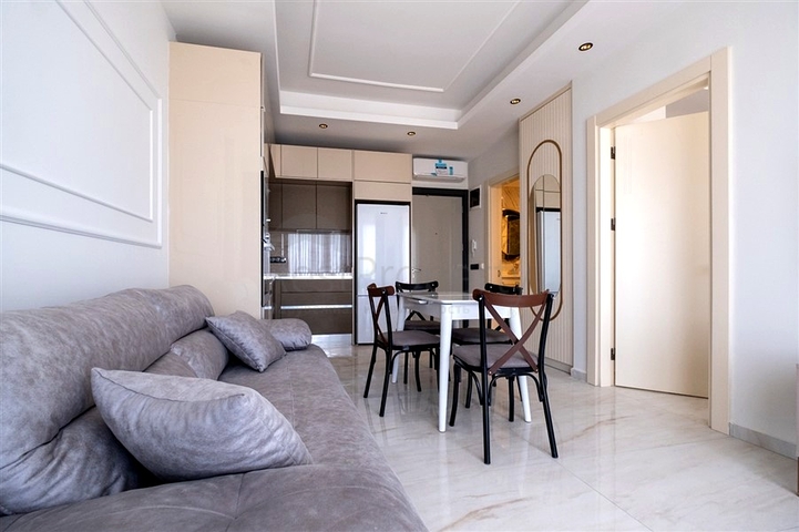 Уютная меблированная квартира в современном жилом комплексе у побережья