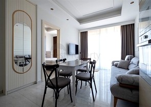 Уютная меблированная квартира в современном жилом комплексе у побережья