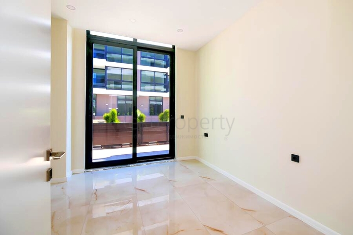 Современный дуплекс 3+1 с приватным садовым уровнем в престижной части Аланьи