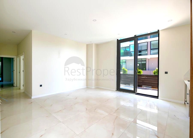 Современный дуплекс 3+1 с приватным садовым уровнем в престижной части Аланьи