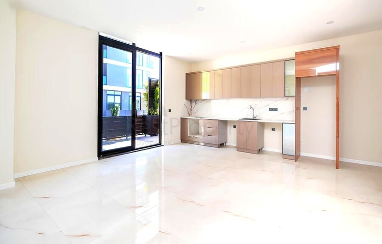 Современный дуплекс 3+1 с приватным садовым уровнем в престижной части Аланьи