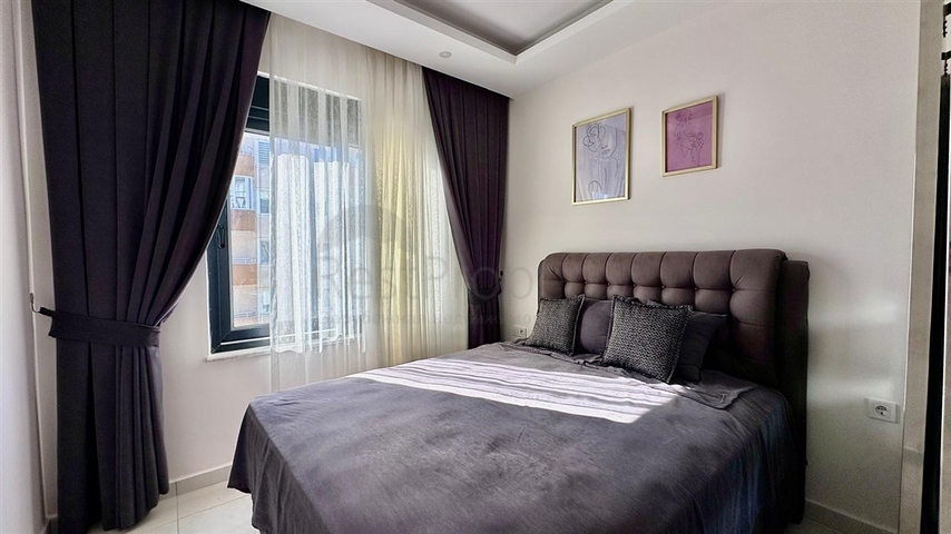 Уютная квартира 1+1 в современном доме в Махмутларе