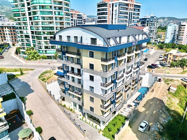 Уютная квартира 1+1 в современном доме в Махмутларе