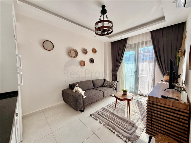 Уютная квартира 1+1 в современном доме в Махмутларе