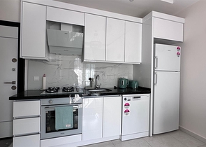 Уютная квартира 1+1 в современном доме в Махмутларе