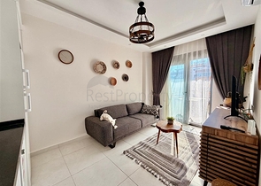 Уютная квартира 1+1 в современном доме в Махмутларе