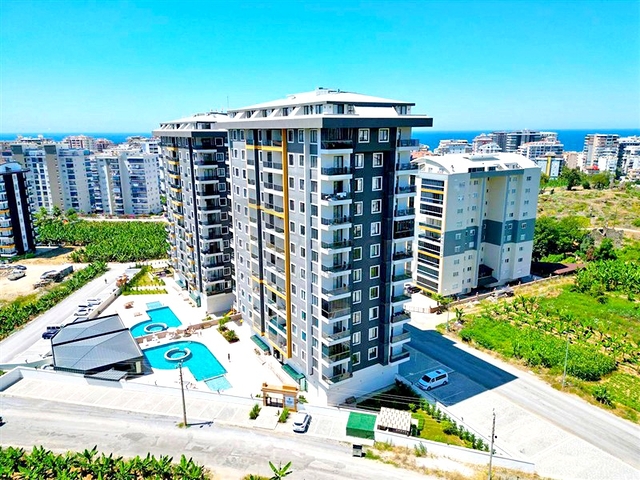 Современная квартира 1+1 в развитом районе Алании