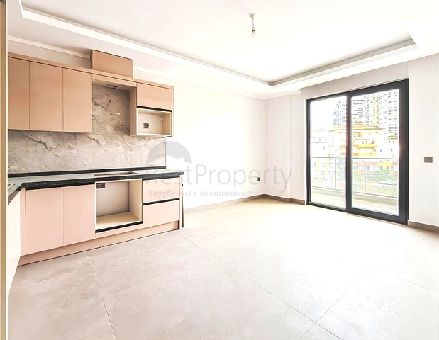 Современная квартира 1+1 в развитом районе Алании