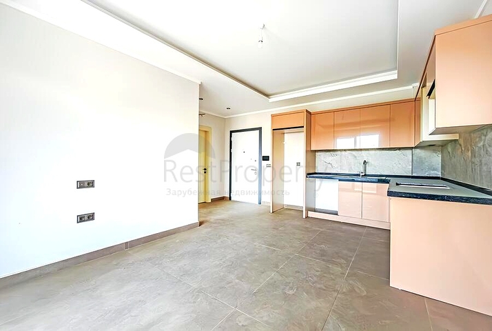 Современная квартира 1+1 в развитом районе Алании