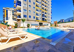 Современная квартира 1+1 в развитом районе Алании